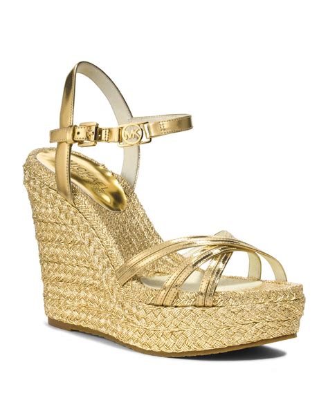 gold michael michael kors footwear wedges|Michael Kors gold flat sandals.